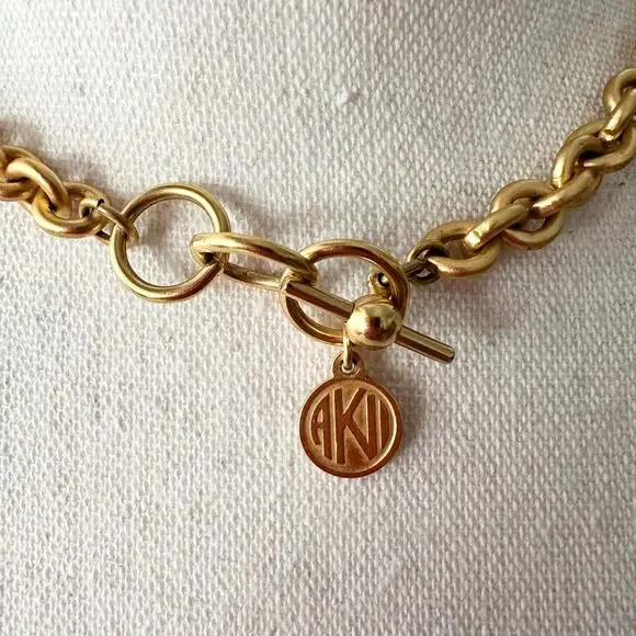 Anne Klein Vintage 80s Gold Tone Celestial Carved Medallion Charm Necklace RARE